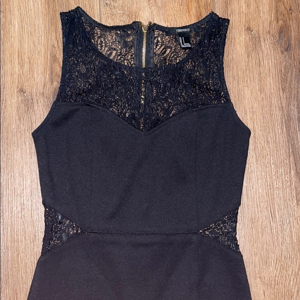 Black mini dress with lace cutouts